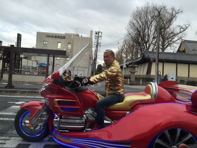 Gold lame biker in Kyoto